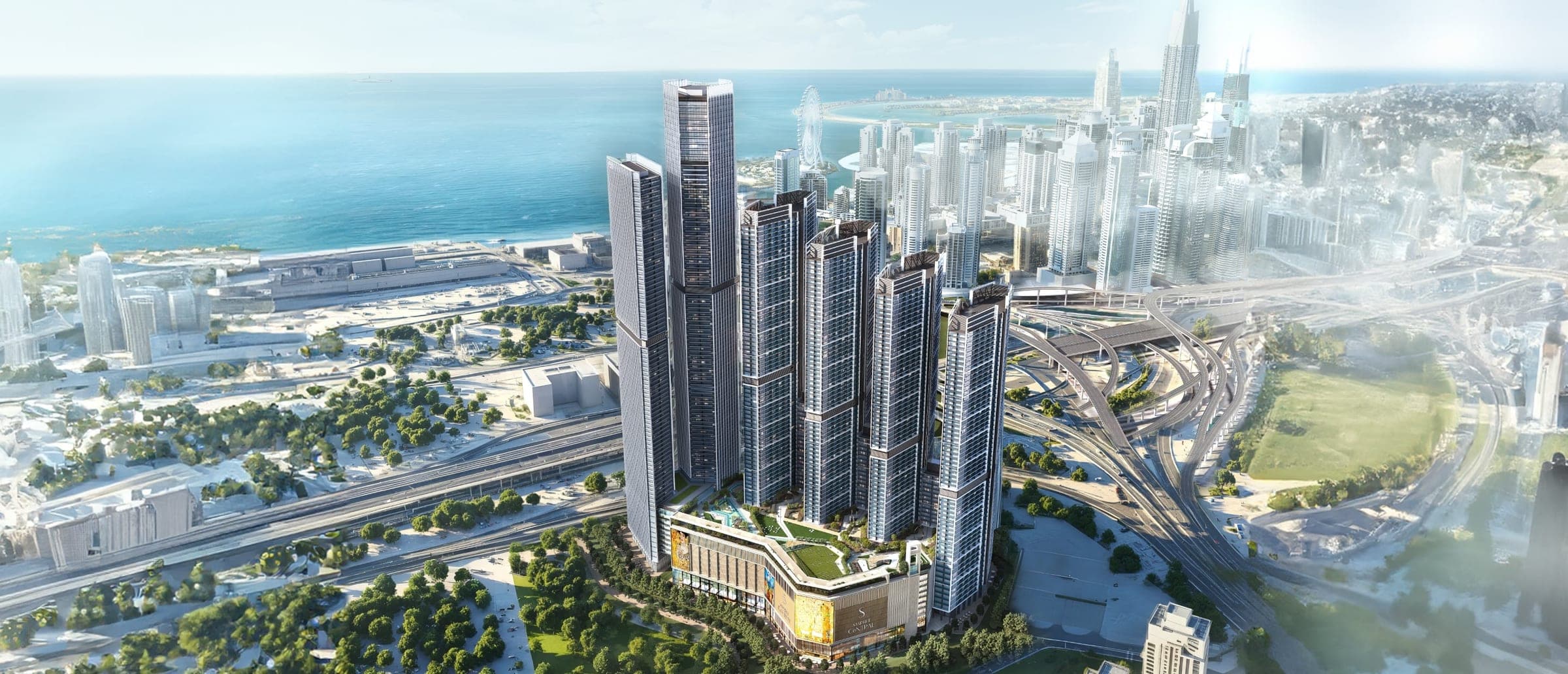 Render of Sobha Central from the air, the tower cluster set along Sheikh Zayed Road with the coast and the wider city behind